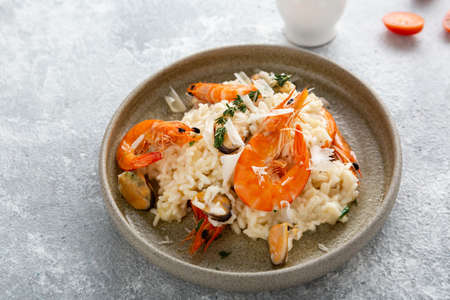 Rice with seafood in bowl close upの写真素材