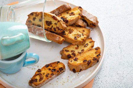 Close up of sweet cantuccini almond biscuits on plate copy spaceの写真素材