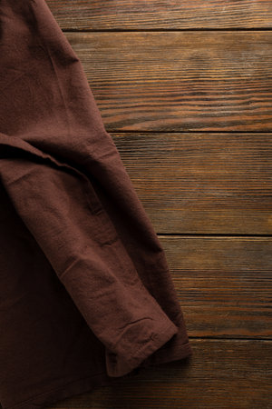 Top view of kitchen fabric on wooden backdropの写真素材