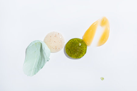 Pilling creamy smears scrub cream gel with particles. Concept of body care proceduresの写真素材