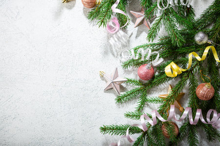 Light Christmas holiday background with green fir branches decorの写真素材