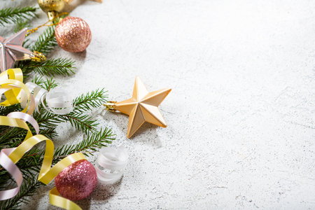 Light Christmas holiday background with green branchesの写真素材