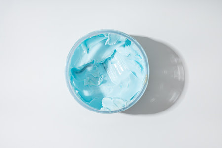 Top view of blue cream boby sutter in jar cometic productsの写真素材