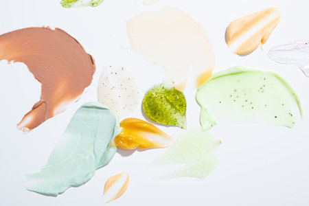 Cosmetic creme swatches and smears on light surfaceの写真素材