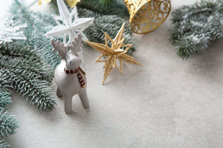 Winter holiday composition with deer and decorationsの写真素材