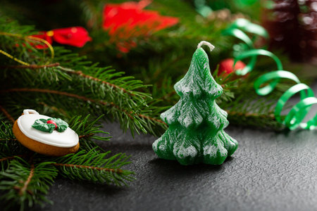 Merry Christmas composition with green New year tree candleの写真素材