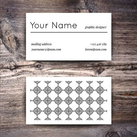 Business card template with creative white and black retro pattern on wooden backgroundのイラスト素材