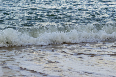 Beautiful soft wave crashing in the sand beach. Ko Samui, Tailand