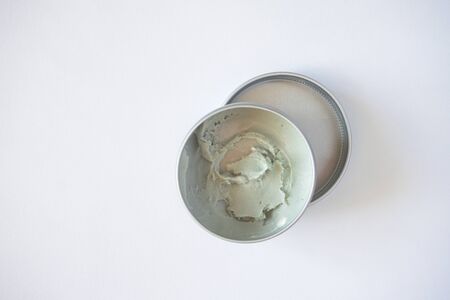 Deodorant cream environmentally friendly in metal container on white background. Zero waste concentの写真素材