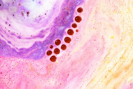 Colorful bubbles of foam bath bomb background, textureの写真素材