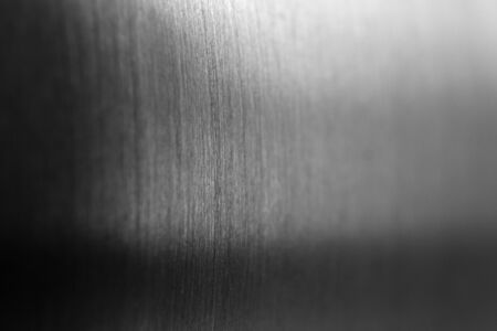 Metal macro background. Textured gray aluminum texture with selective focus, close-upの写真素材