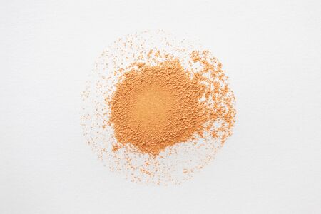 BB cream, CC cream or foundation circle smear on white background. Make-up product texture