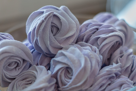 Violet marshmallow in form of roseの写真素材