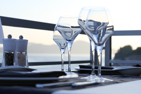 Glasses of wine on romantic blurred background.の写真素材