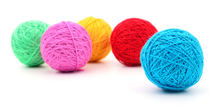 Colorful balls of yarn isolated on white background.の写真素材