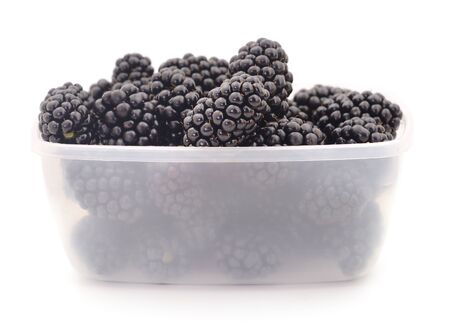 Closeup shot of fresh blackberries. Isolated on white background.の写真素材