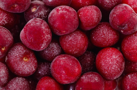 Group of frozen cherries on a white background.の写真素材