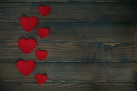 Wooden background with hearts. The concept of Valentine's Dayの写真素材