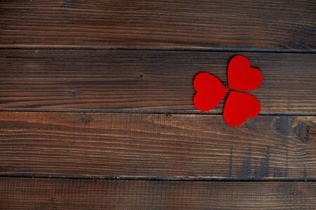 Wooden background with hearts. The concept of love and Valentine's Day.の写真素材