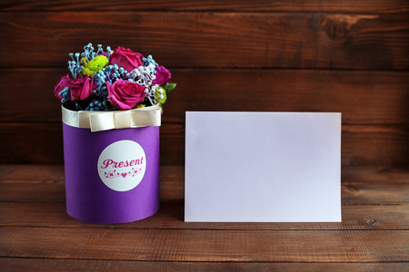 Welcome card with flowers on a wooden background. Conception holiday, Valentine's Day.の写真素材