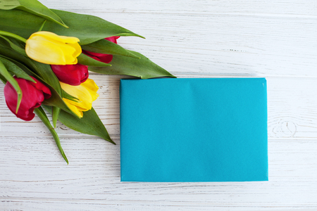 A bouquet of spring flowers tulips. Top view. Concept of holiday, birthday, Easter, March 8.の写真素材
