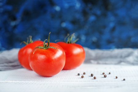 Tasty tomatoes and sweet peppers. The concept of food and vegetarianism.の写真素材