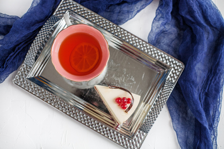 Cake and tea on a tray.  Top view. The concept of food, beverages and desserts.の写真素材