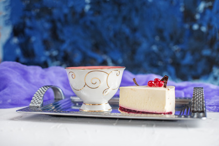 Cake and tea on a tray. The concept of food, beverages and desserts.の写真素材
