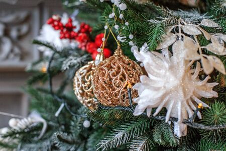 Christmas decor on tree. Christmas tree branch with ball. Concept of Happy Christmas, New Year, holiday, background.の写真素材