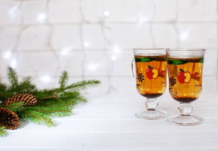 White wooden background. Hot tea. The concept of Christmas and New Year.の写真素材