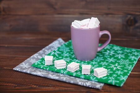 marshmallow delicious coffee on a wooden background. Christmas concept, lifestyle and food.の写真素材