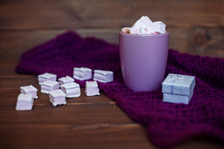 Marshmellow drink in the purple cup. The concept of beverages and food.の写真素材