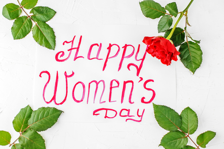 Background with greetings and flowers. Concept of Happy Women's Day.の写真素材