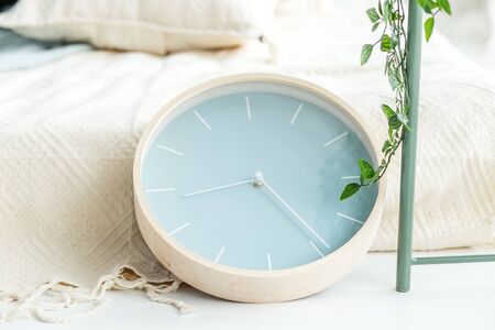Beautiful modern round clock. Concept interior, decoration, comfort in the house.の写真素材