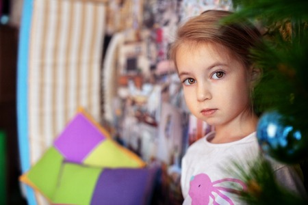little girl in pajamas. The concept of Christmas and New Year
