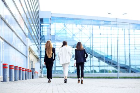 Successful women go to the office center. Concept for business, boss, robot, team and successの写真素材