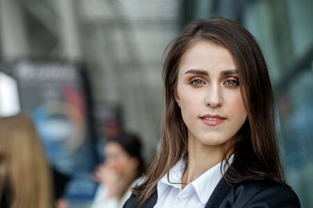 Beautiful young confident woman. Professional manager. Concept for business, work, career and entrepreneurship.の写真素材