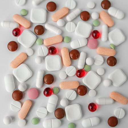 Many different pills on white background. Copy space. Top view. Concept of pharmaceuticals, medicine and healthcare. Squareの写真素材