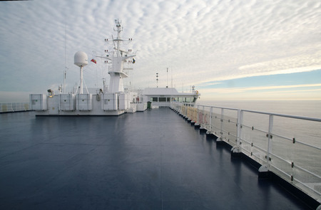On the deck of the cruise ship in the morningの写真素材