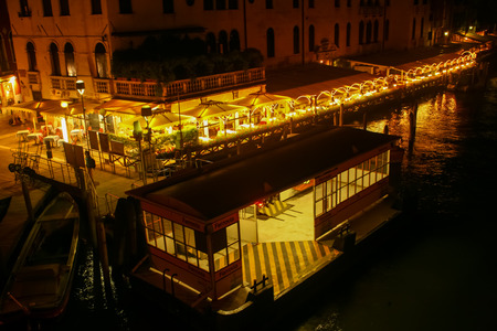 Water-bus stop "Ferrovia" at night (Italy, Venice)の写真素材