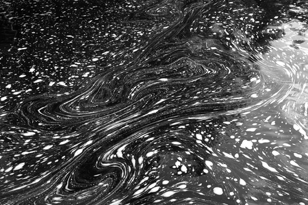 White foam stains on the riverの写真素材
