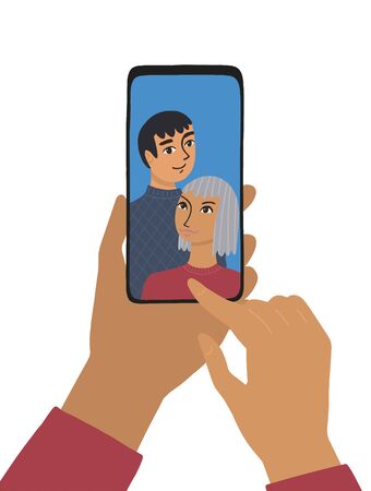 The female hand holds a smartphone. The concept of photography, chat, video call. Woman and man smiles and takes a selfie, hand clicks on a touch phone. Flat vector illustration on white background.のイラスト素材