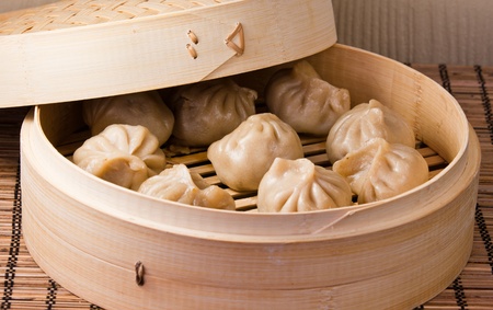 Steamed dumplings in a bamboo basketの写真素材