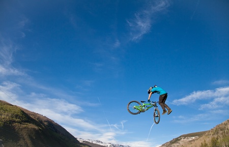 Vail, Colorado, USA - June 3rd 2011 - The Teva Mountain Games - Bike Slopestyle finale : bike jump, high in the air のeditorial素材