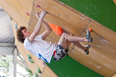 Vail, Colorado, USA - June 3rd 2011 - The Teva Mountain Games - Bouldering World Cup, qualification - Guillaume Glairon Mondet in the 3rd problemのeditorial素材