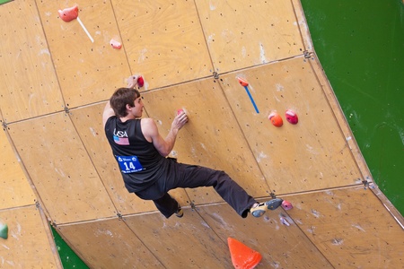 Vail, Colorado, USA - June 3rd 2011 - The Teva Mountain Games - Bouldering World Cup, qualification - Daniel Wood is flashing the 3rd problemのeditorial素材