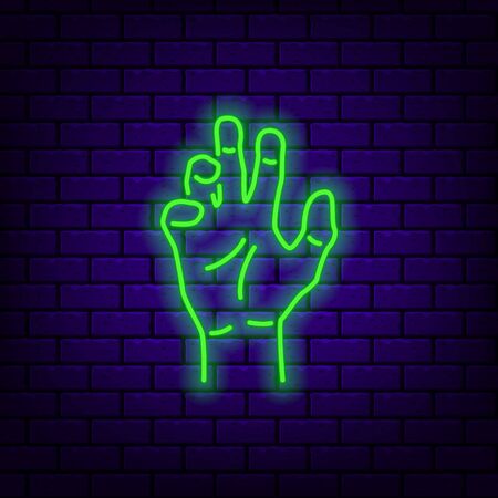 Neon zombie hand icon on dark brick background.のイラスト素材