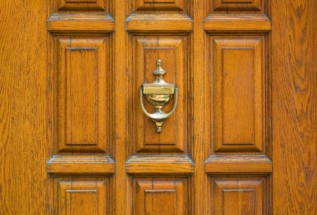 an old metal door handle knockerの写真素材
