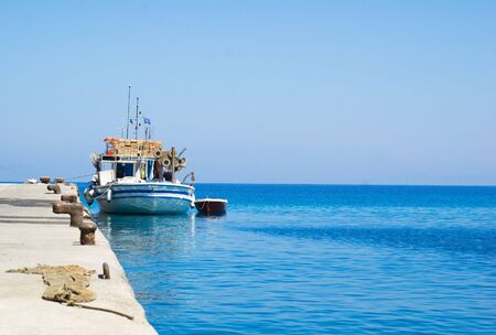 Fishing boats in the harbor の写真素材