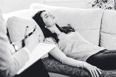 Psychiatrist and young woman patientの写真素材